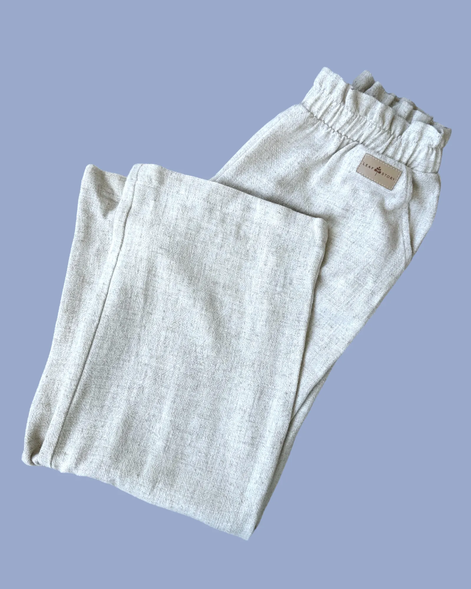 Szerokie spodnie lniano - wiskozowa z falbanką w pasie - naturalny
