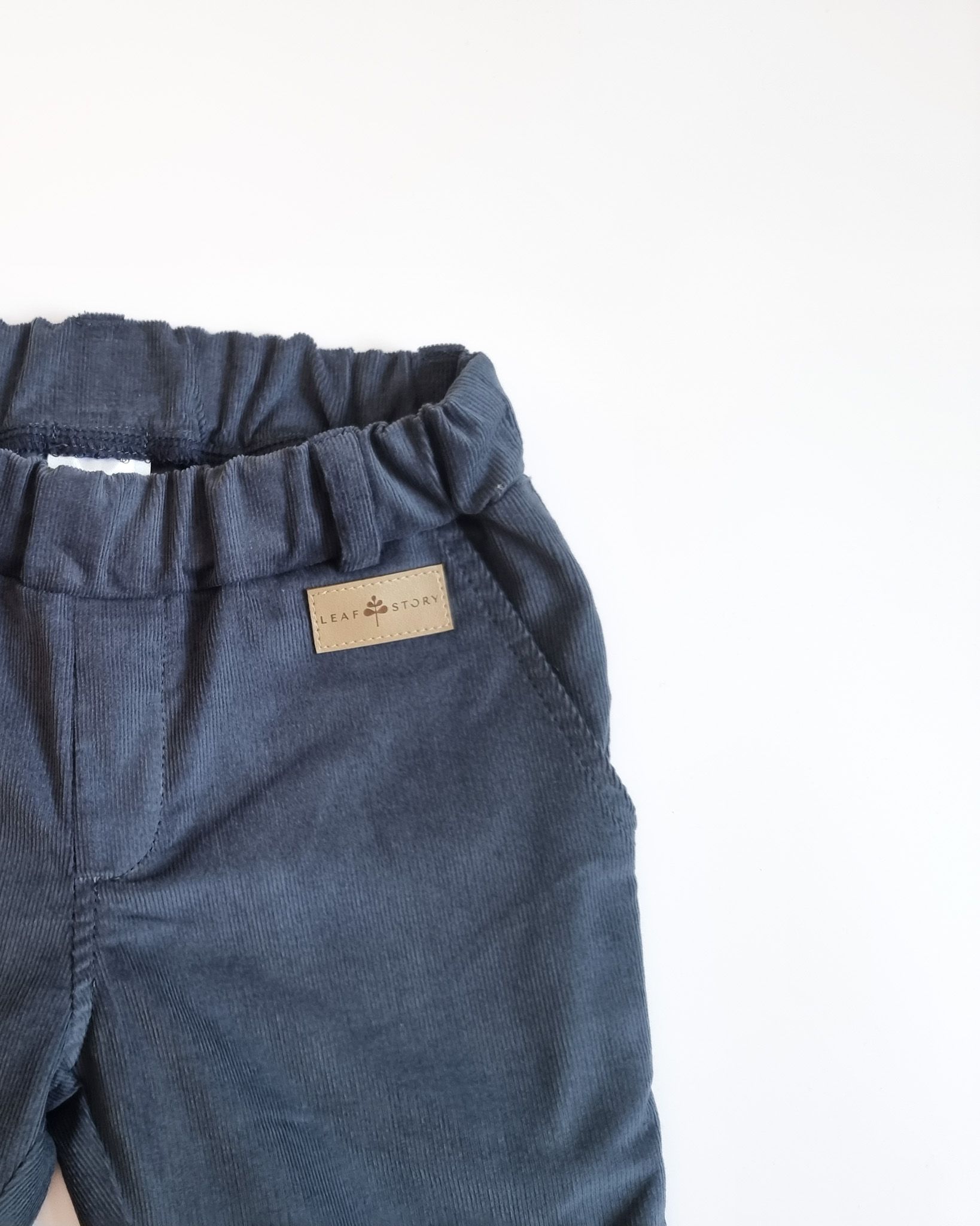 Sztruksowe spodnie ze szlufkami i regulacją pasa - jeans - 86/92